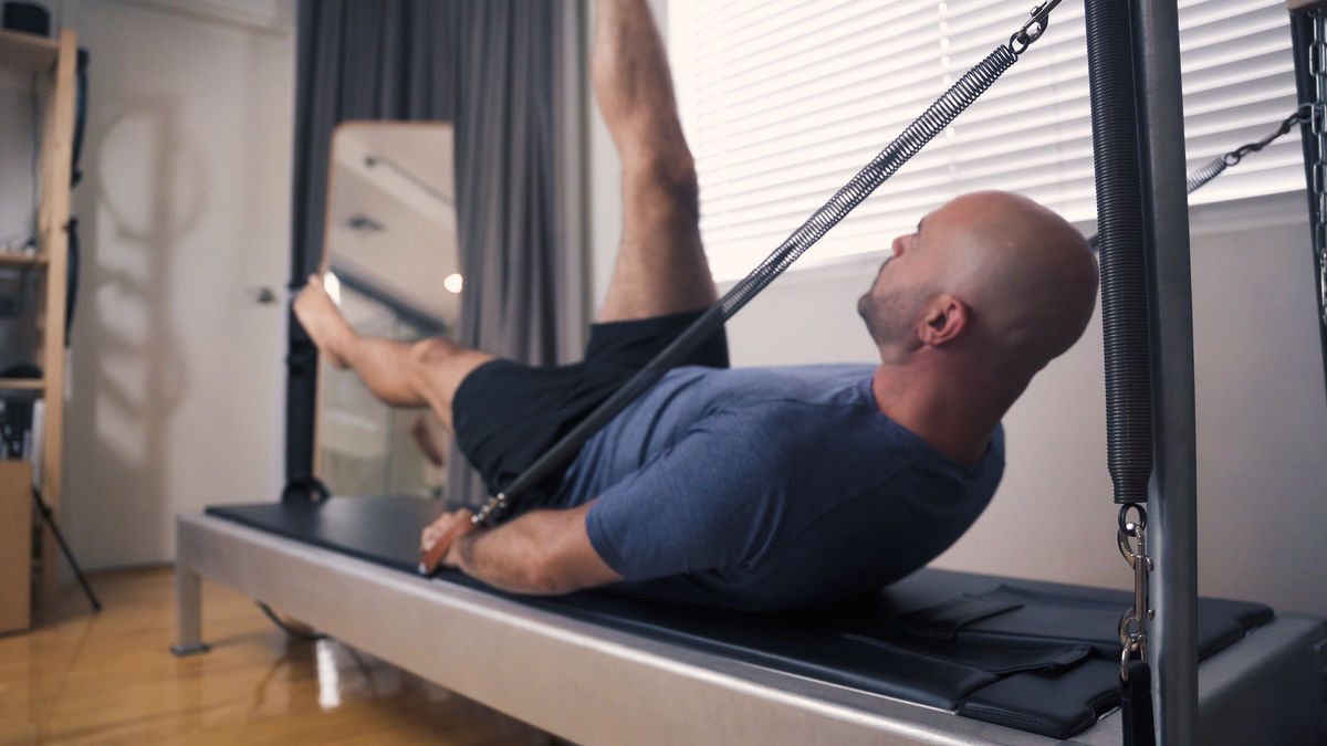 Image of a person progressing through various Pilates exercises, symbolizing the journey from beginner to mastery.